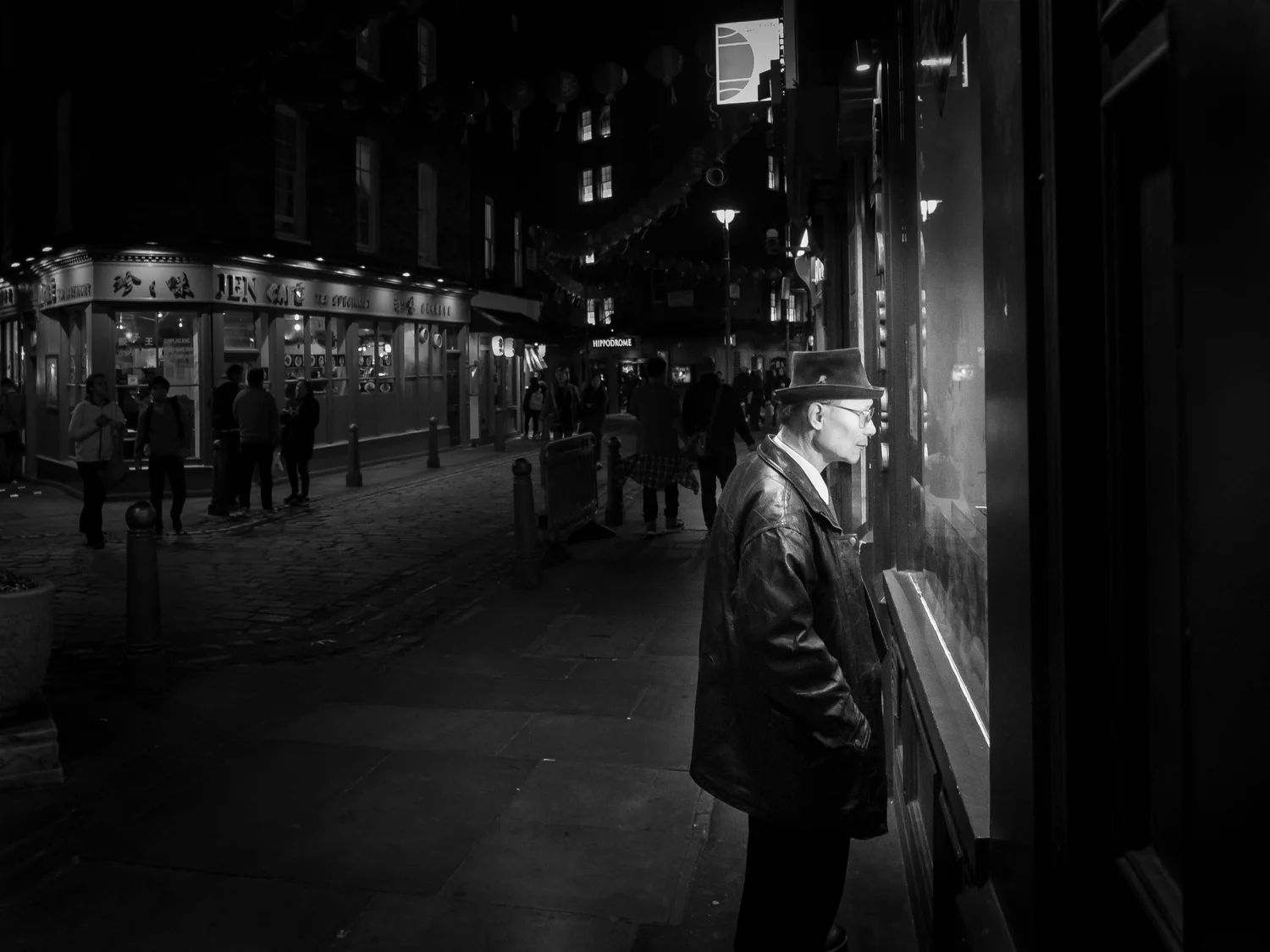 Through use of light and shadows this image successfully leads the viewer's eye to the illuminated subject. Note however that the background is illuminated just enough&nbsp;to help tell the story, whilst at the same time is not too bright so that it…