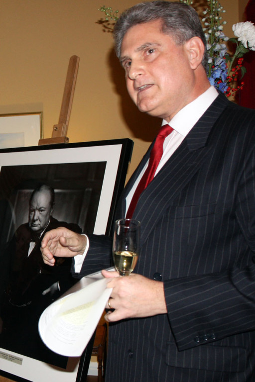 High Commissioner Dr. Andrew Pocock and the Karsh portrait.
