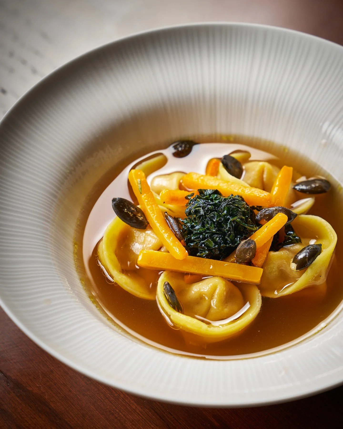 Duck, foie gras, squash tortellini. Parmesan broth. @savernenyc