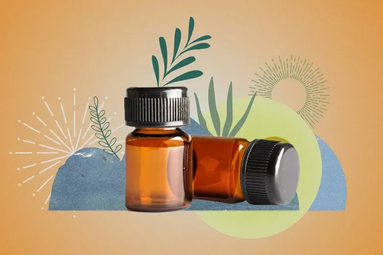 Two small amber medication bottles with black caps, one standing upright and the other laying on its side, on a decorative background with abstract shapes and plant illustrations.