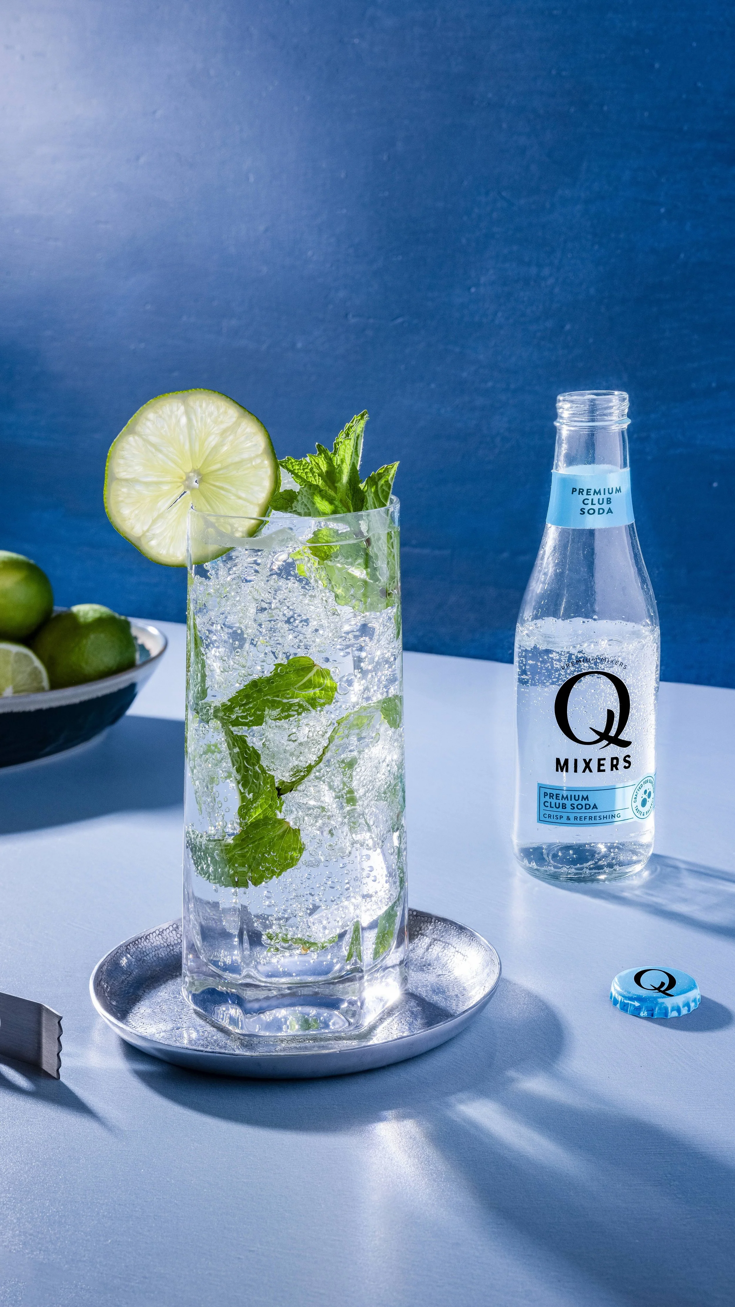 Q Mixers_ClubSoda_MOJITO_bottle_9x16.jpeg