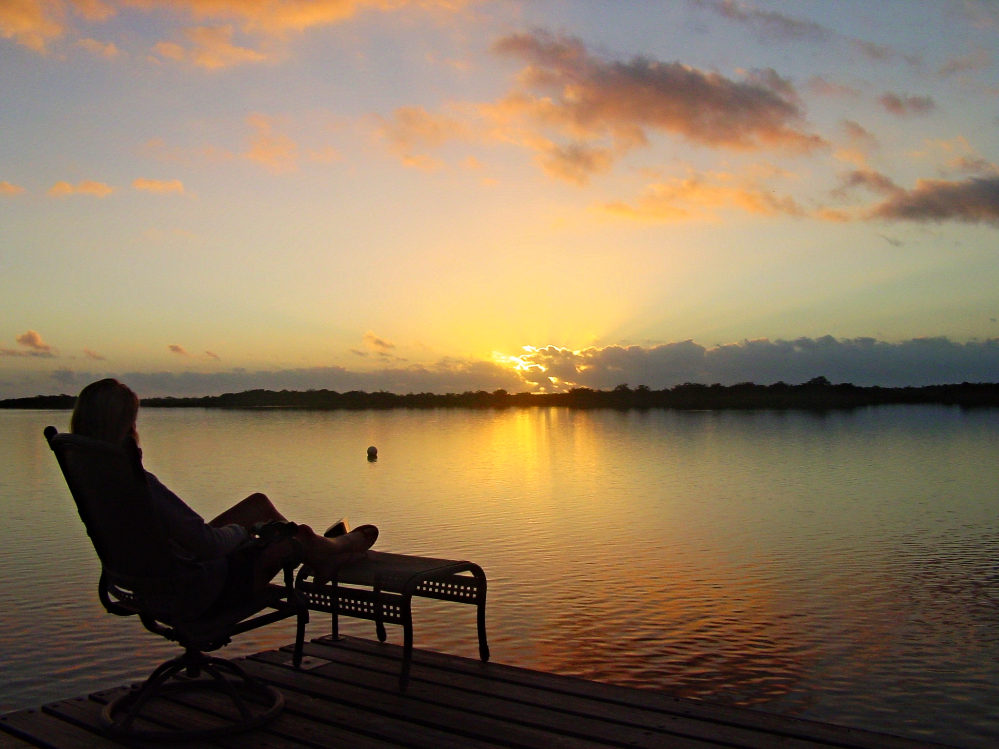 Dawn over the lagoon at the Lamanai Outpost Lodge