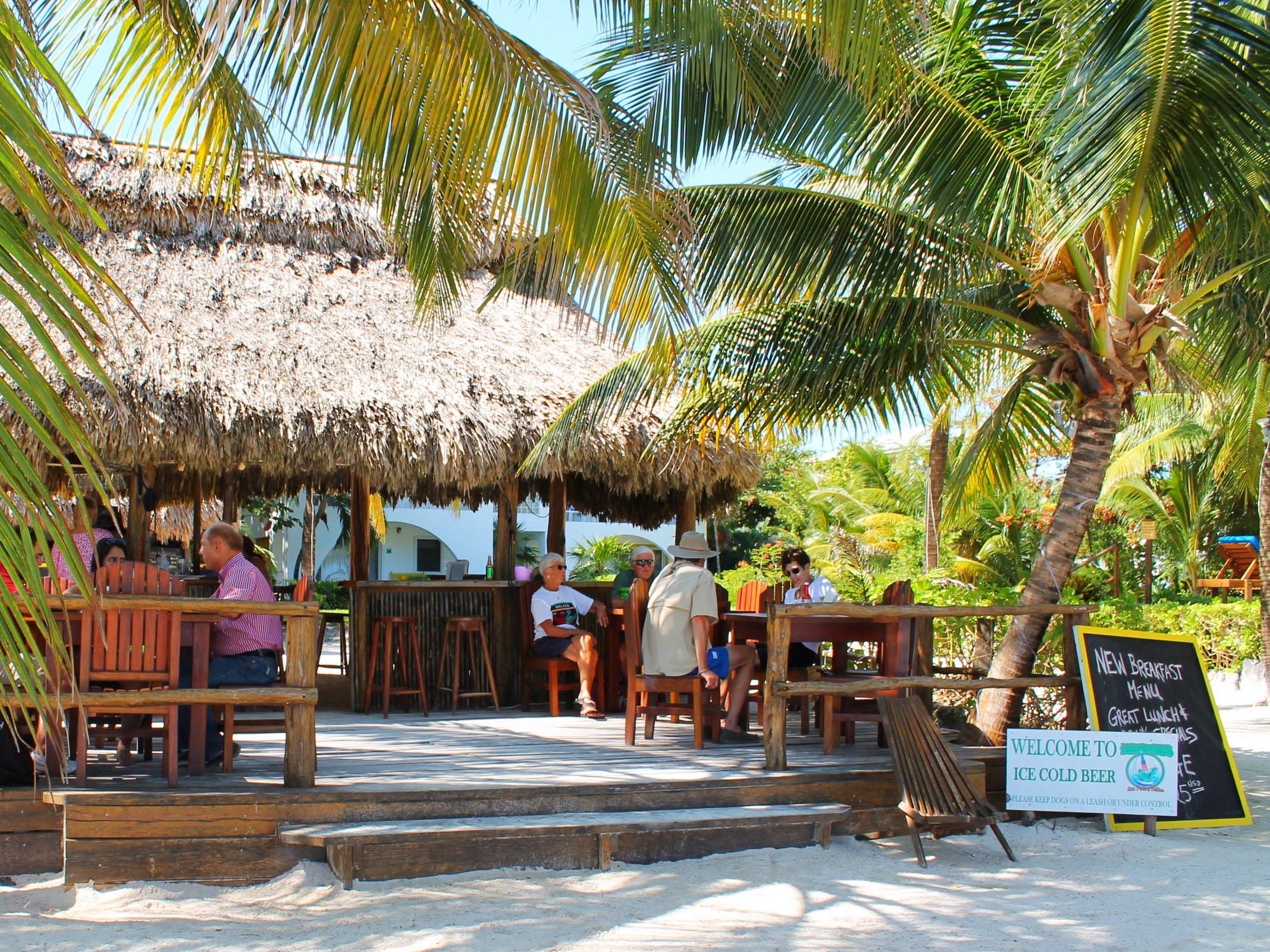 Pausing for a cold Belikin in a friendly place is a must on Ambergris Caye