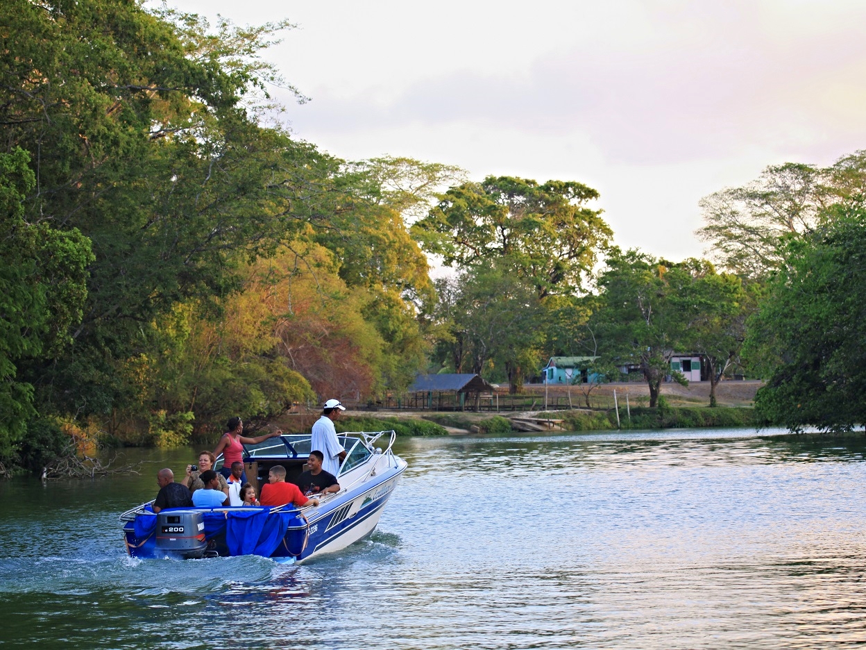 Taking a boat ride on the Old Belize River