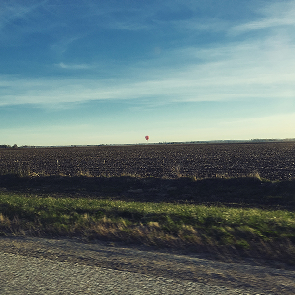 APRIL 9th: Katie drives to Schuyler, Justin takes a photo of a balloon.