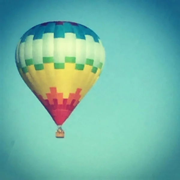 MAY 5th: Justin drives to Omaha, Katie takes a photo of a balloon.