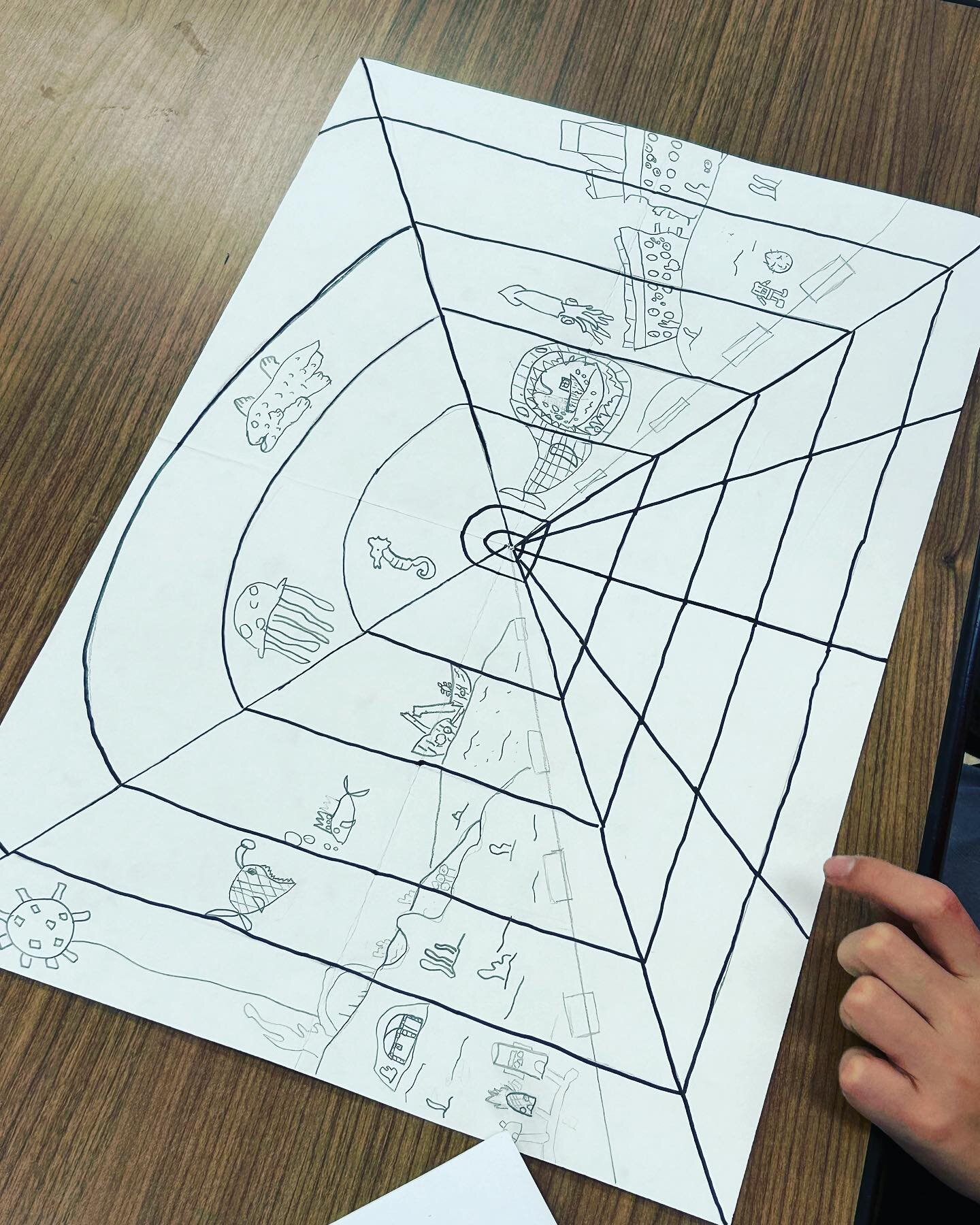 Working on fourth grade one point perspective aquariums!