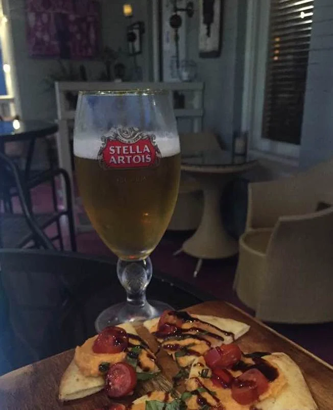 Stella and flatbread on porch.jpg
