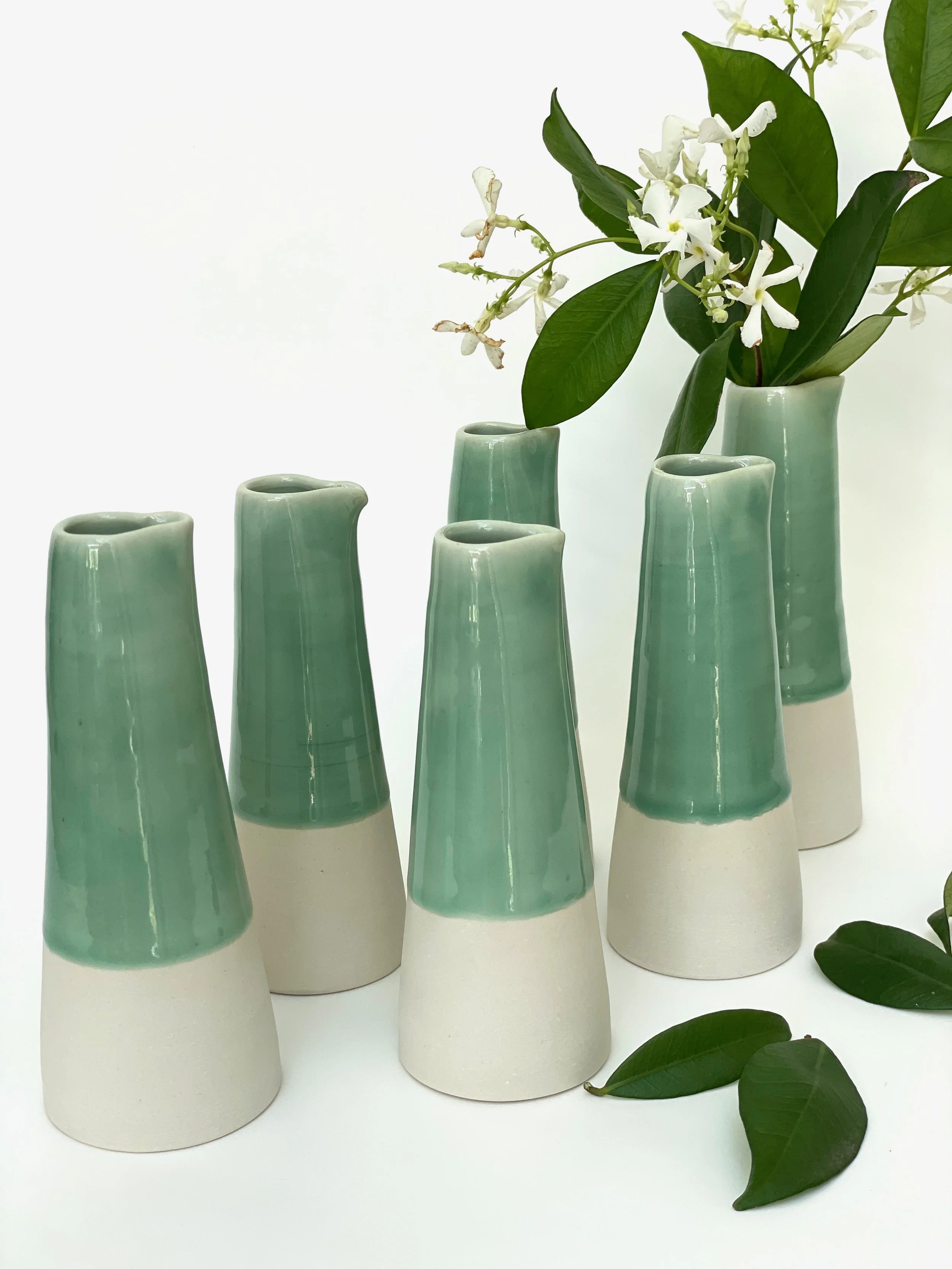Tall ceramic milk pourer with spout and celadon glaze