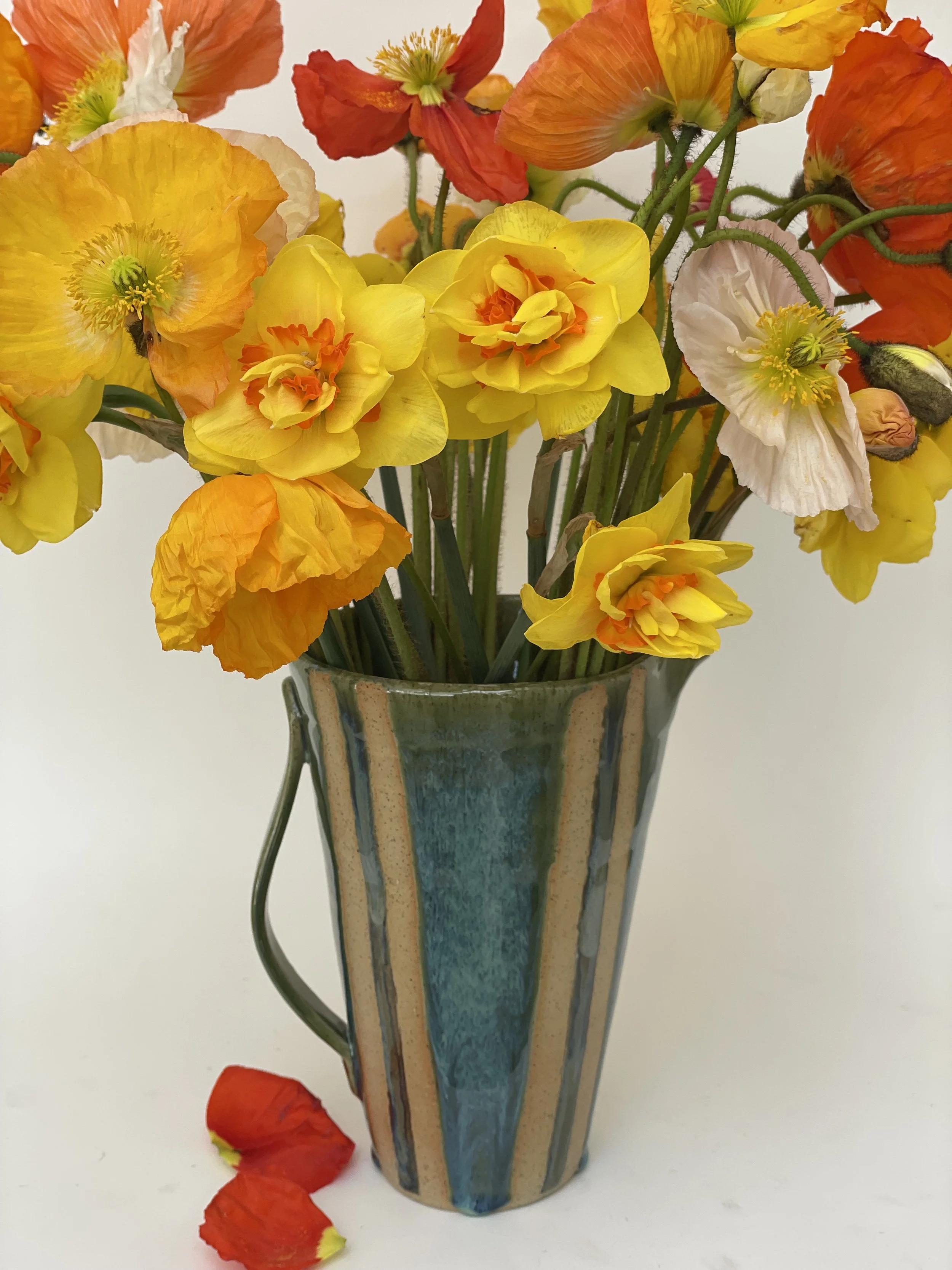 Handmade ceramic striped jug or vase