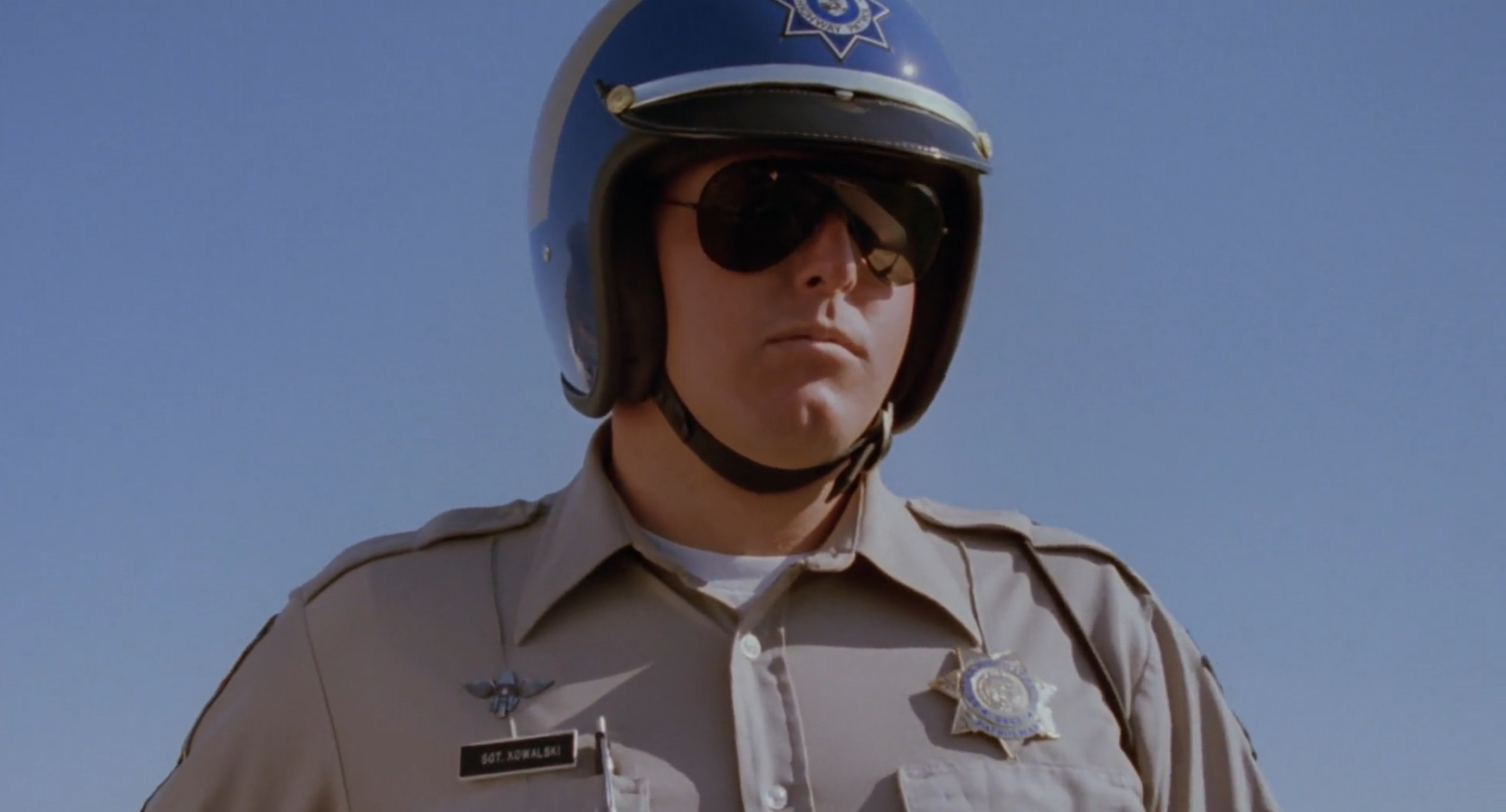 Sgt. Kowalski (Raising Arizona, 1987)