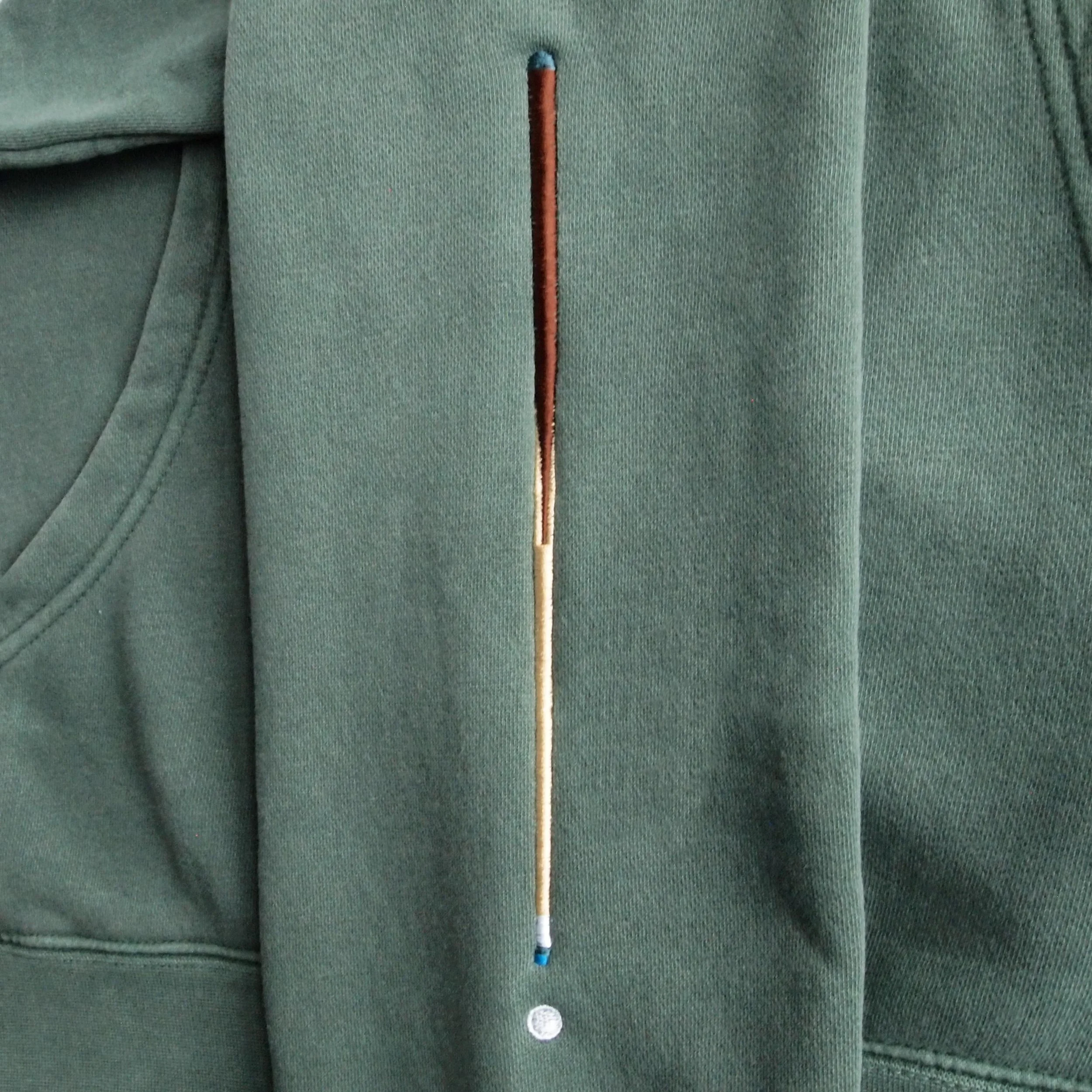 rackedHoody_photo_artwork_arm.jpg