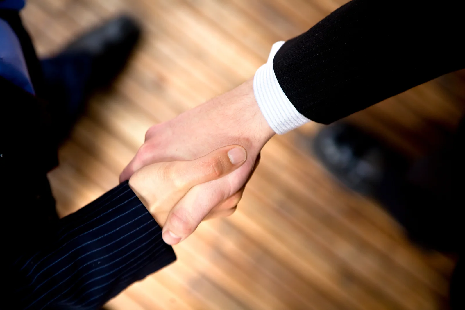 bigstock-Business-Handshake-2033677.jpg