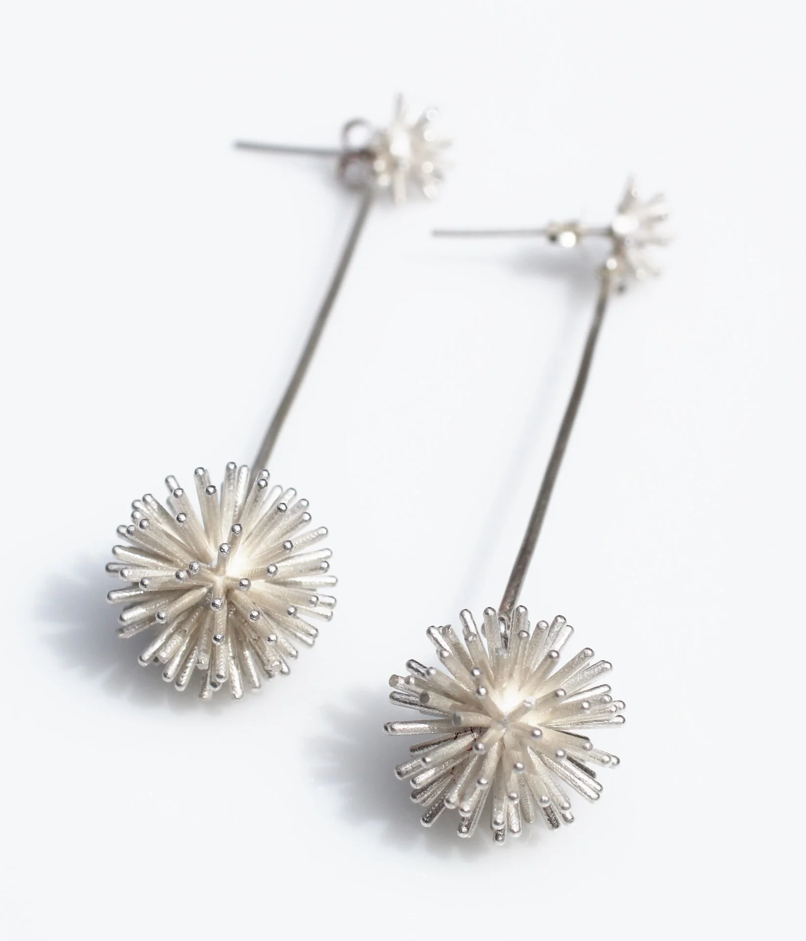 Burst drop earrings.jpg
