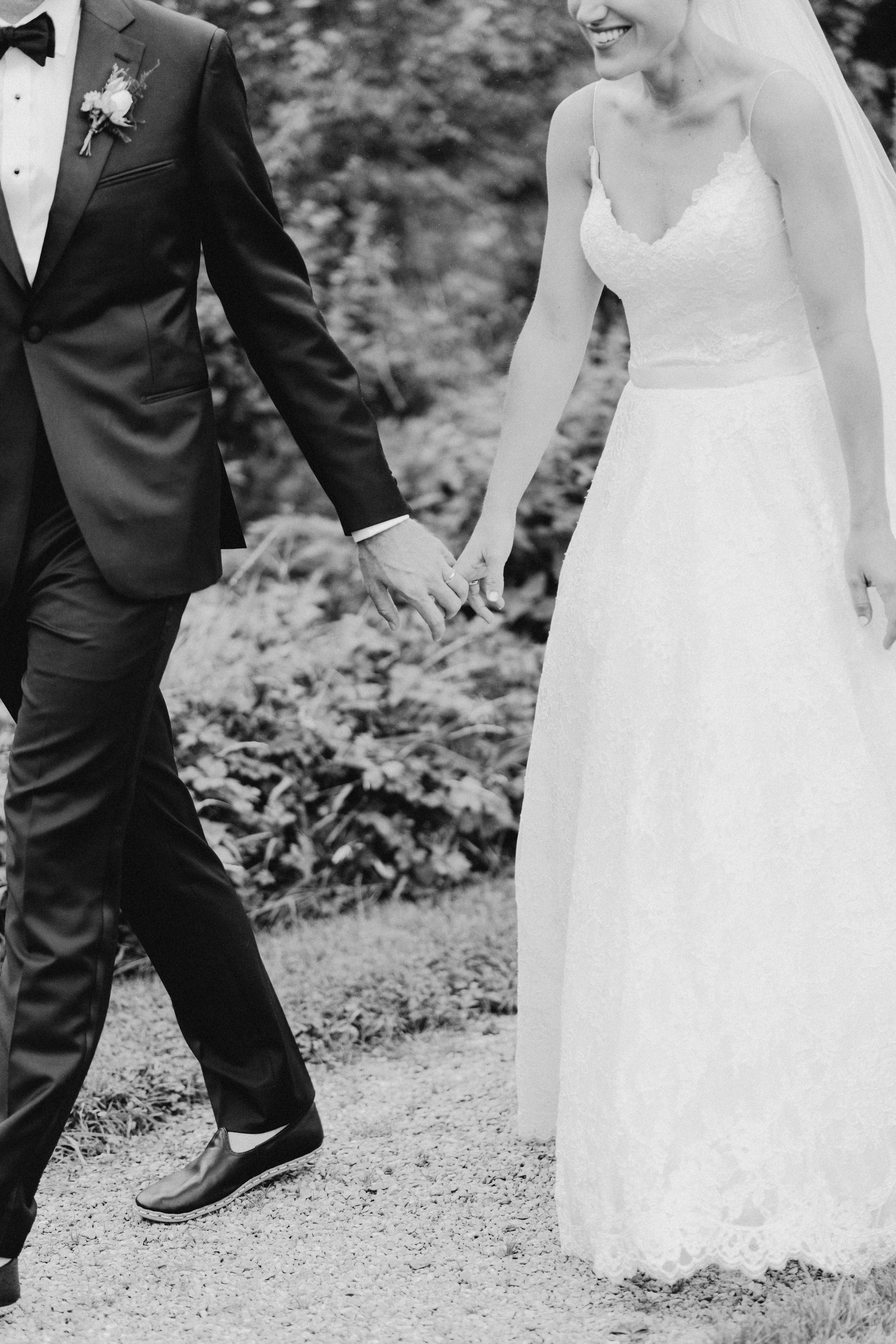 Black tuxedo and wedding gown