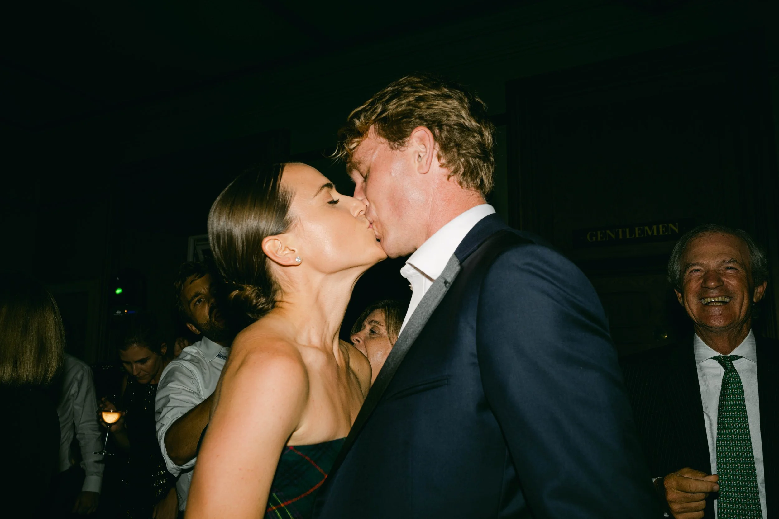 Bride and groom kiss