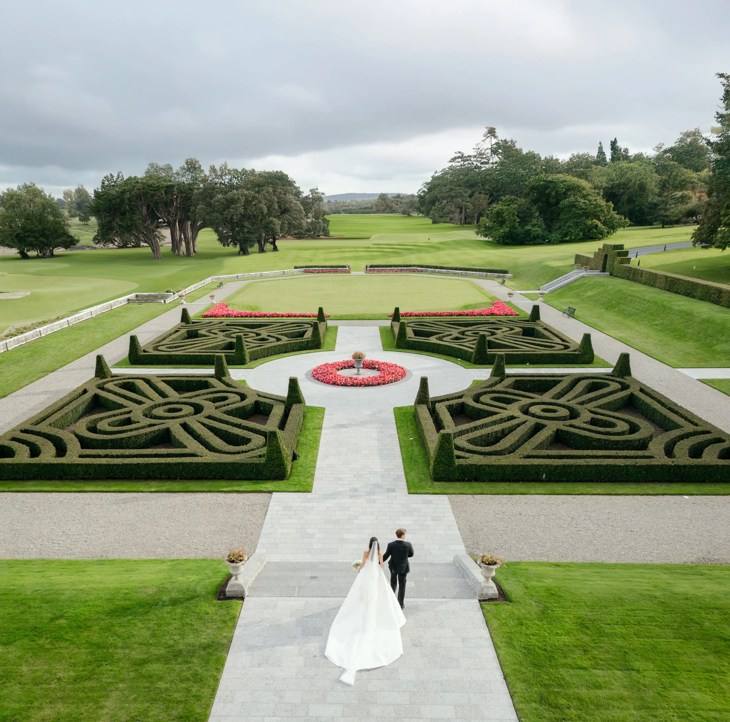Drone shot of wedding couple in the gardens at Adare Manor