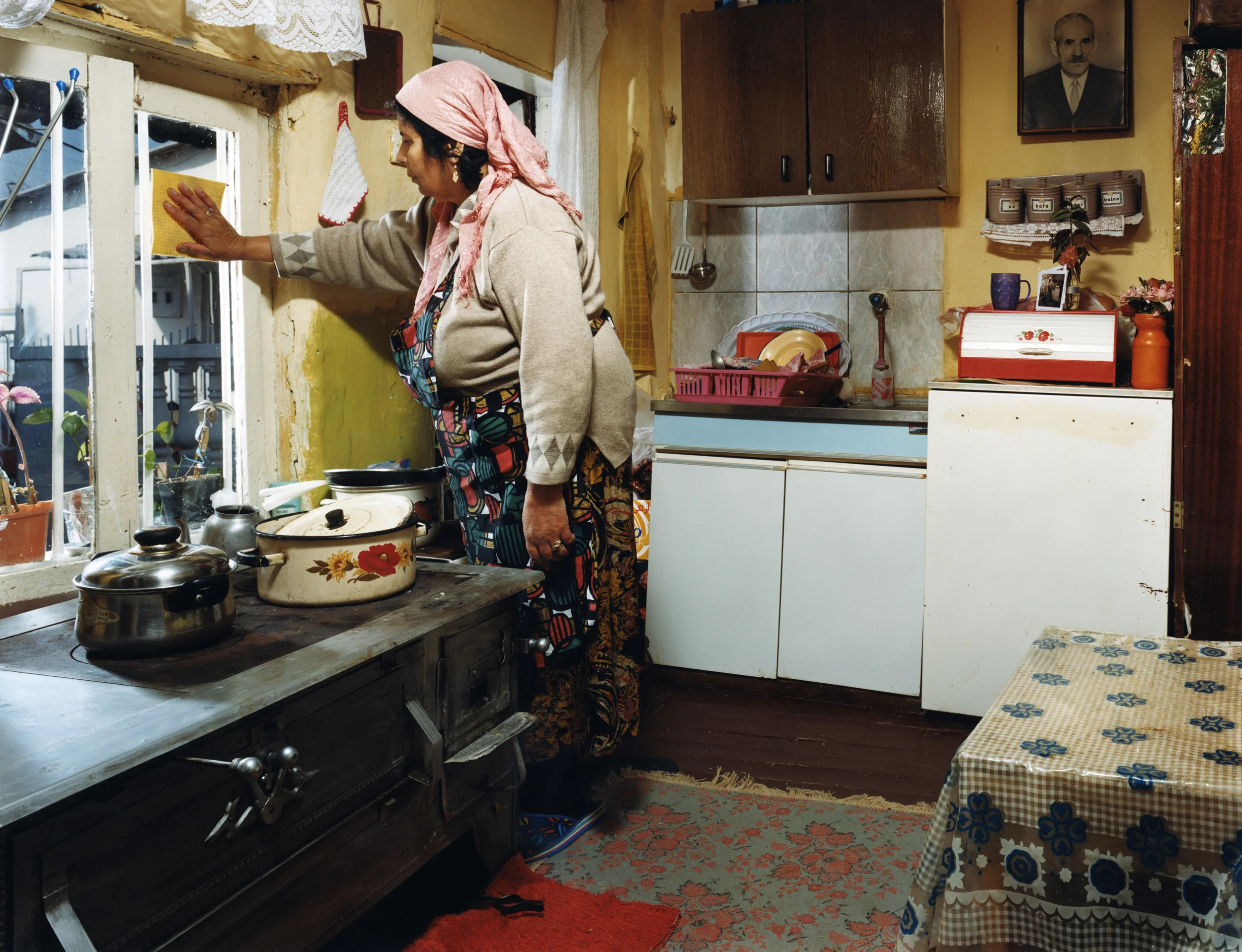 Gypsie (Roma) woman - photographed in her home in Shutka, Macedonia. Shutka, just outside of the Mecedonian capital Skopia is the only fully autonomous Roma-run town in Europe, with it's own news station, school system and municipal administration