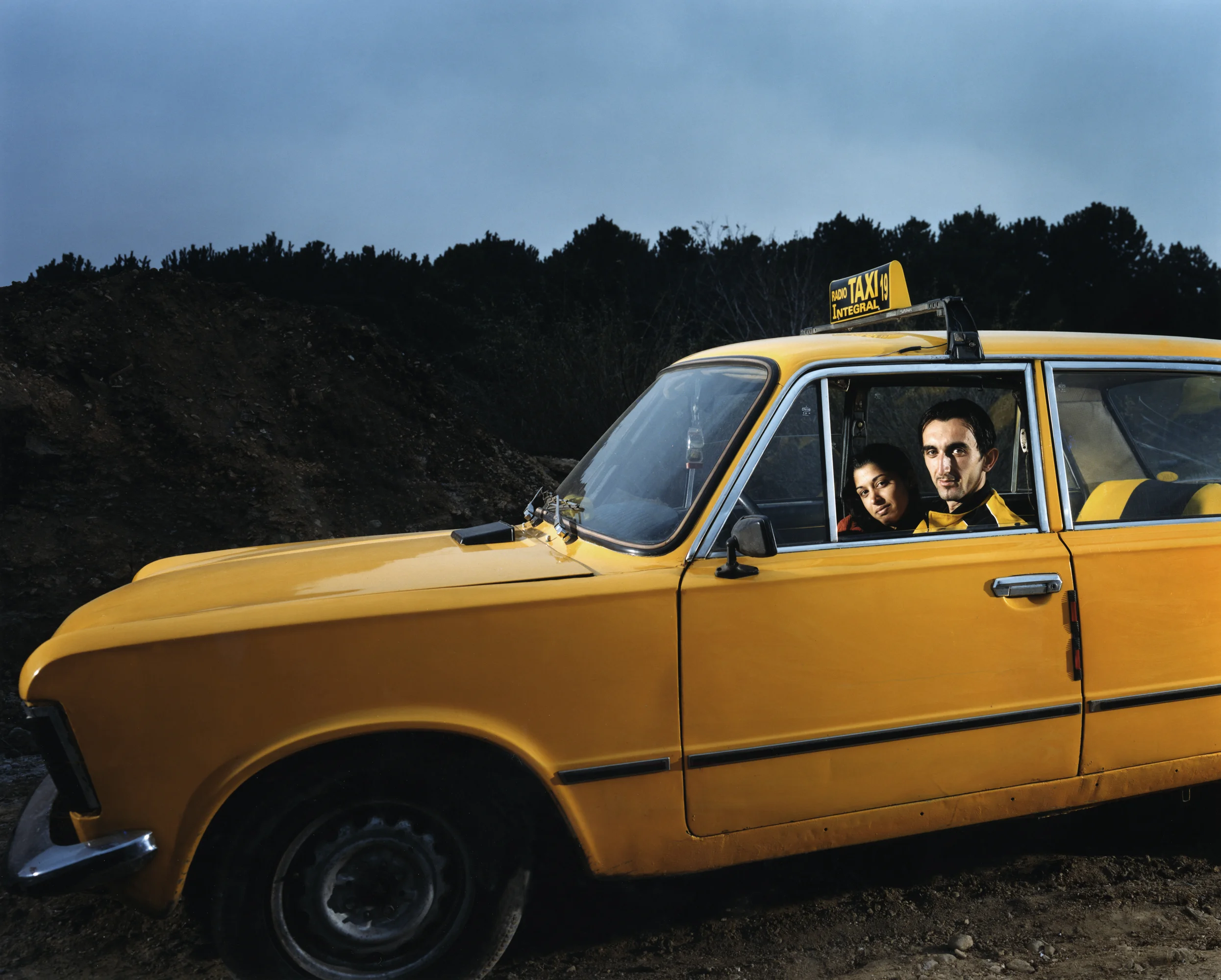 Gypsie (Roma) taxi driver - Shutka, Macedonia. Shutka, just outside of the Mecedonian capital Skopia is the only fully autonomous Roma-run town in Europe, with it's own news station, school system and municipal services. Romani serves as the official language. 