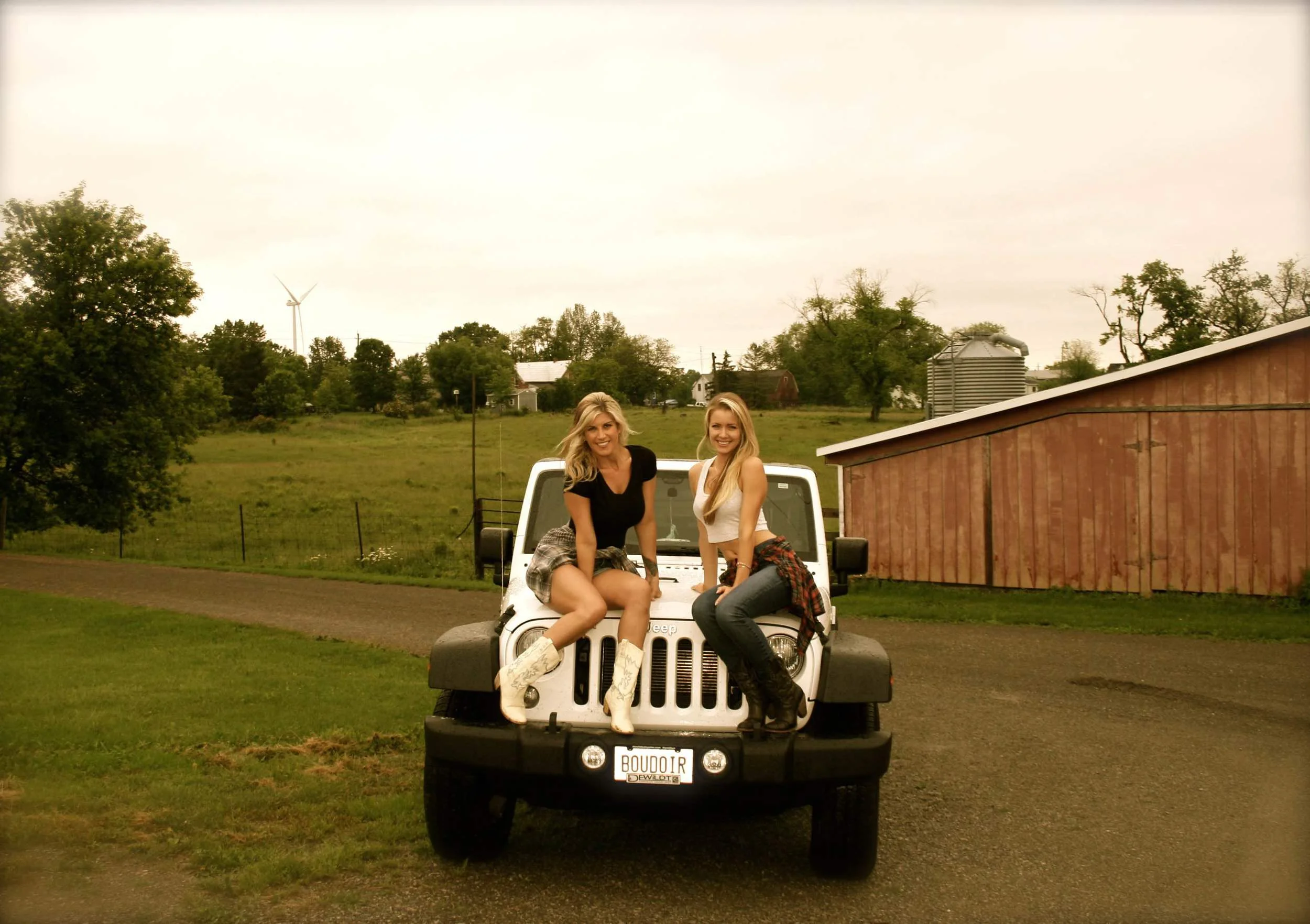 MELISSA KELLY Boudoir Photographer and her Hairstylist Brittani Muir on location for The Cowgirl Sessions. *Notice the license plate:)