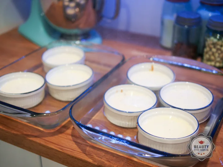 &nbsp;Divide custard evenly among ramekins with a ladle, returning ramekins to roasting pan.&nbsp;&nbsp;Fill pans with water half way. Careful not to get any water into the custard.