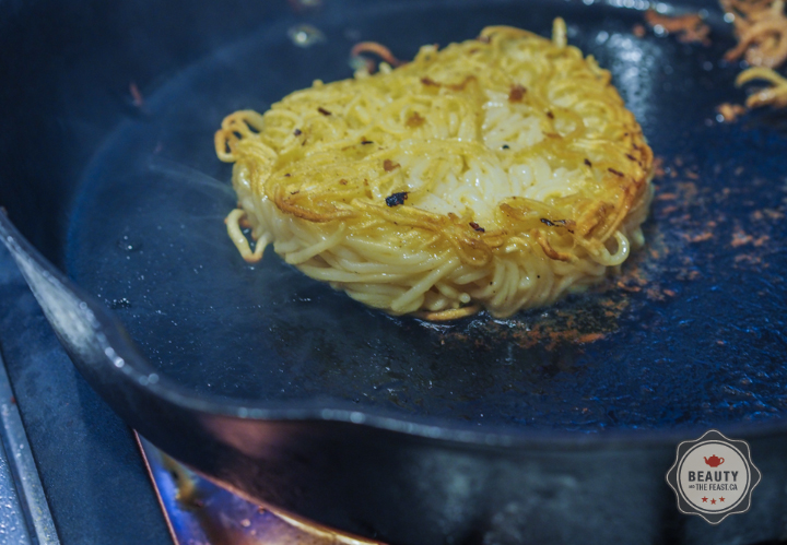Frying up the 'Bun'... Meanwhile, John was BBQing up the sirloin burger outside...