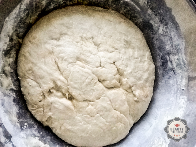 The dough risen and doubled in volume.