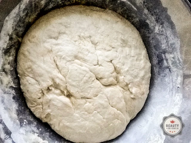 The dough risen and doubled in volume.