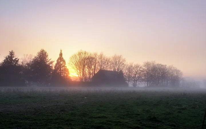 A farm along No 2 Road looking spooky at sunset.