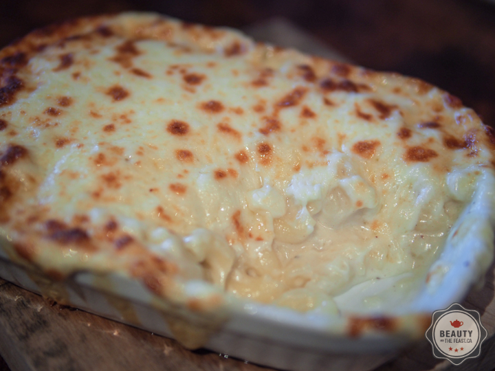 Soft elbows of macaroni bathed in cheesy ecstasy.