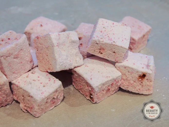 Voila, Fluffy pink marshmallows that taste like real strawberries and even have bits of real fruit in it. What a treat!