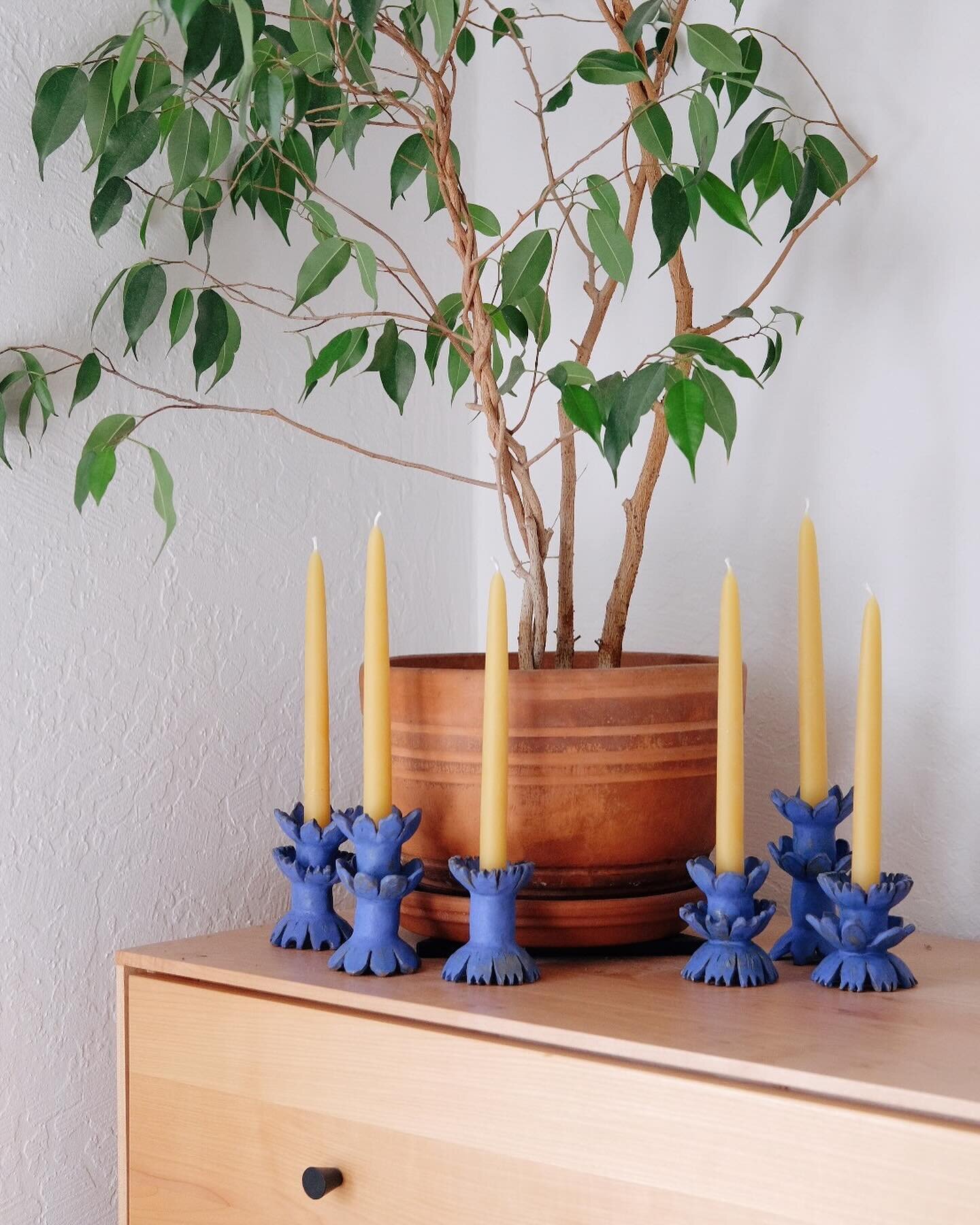 Just dropped off another batch of blue stacked flower tapers to @colibripdx 💙. I&rsquo;m loving the way the matte blue looks in different interiors and the way the glaze highlights the sculptural quality of the forms. The second photo is in @ashleyh