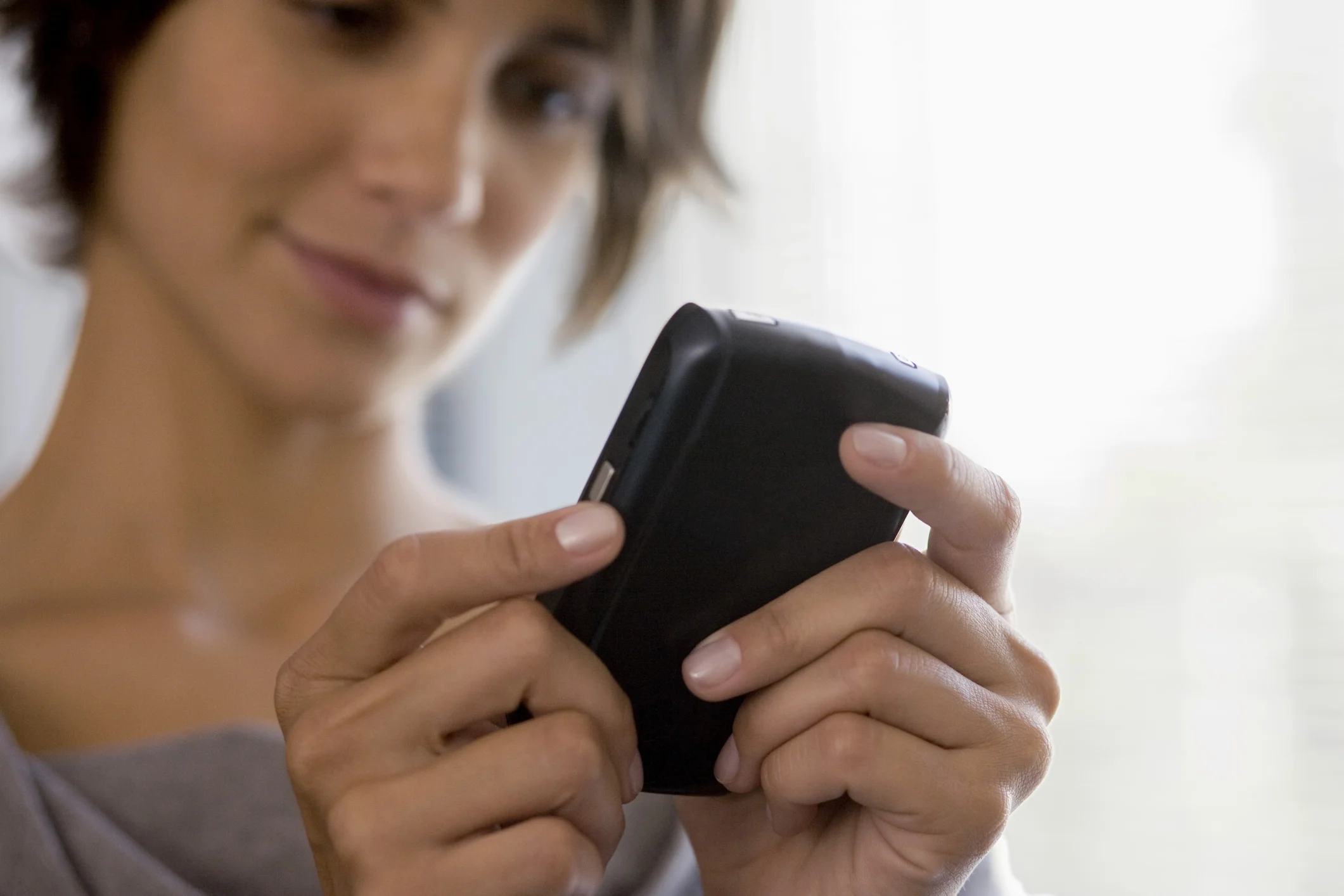 woman-using-cell-phone1.jpg