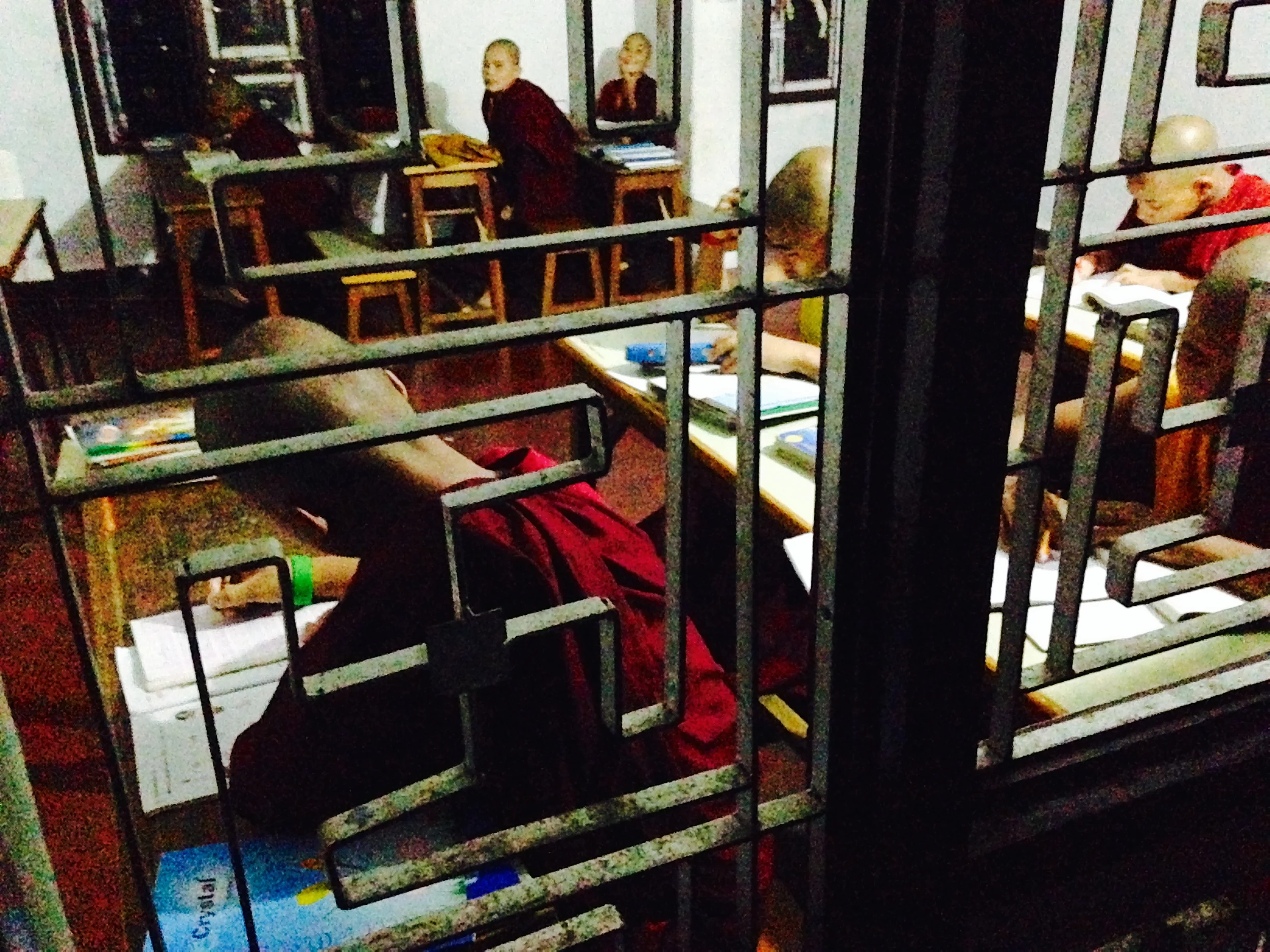 Students doing their homework... after dinner... when it's dark outside.