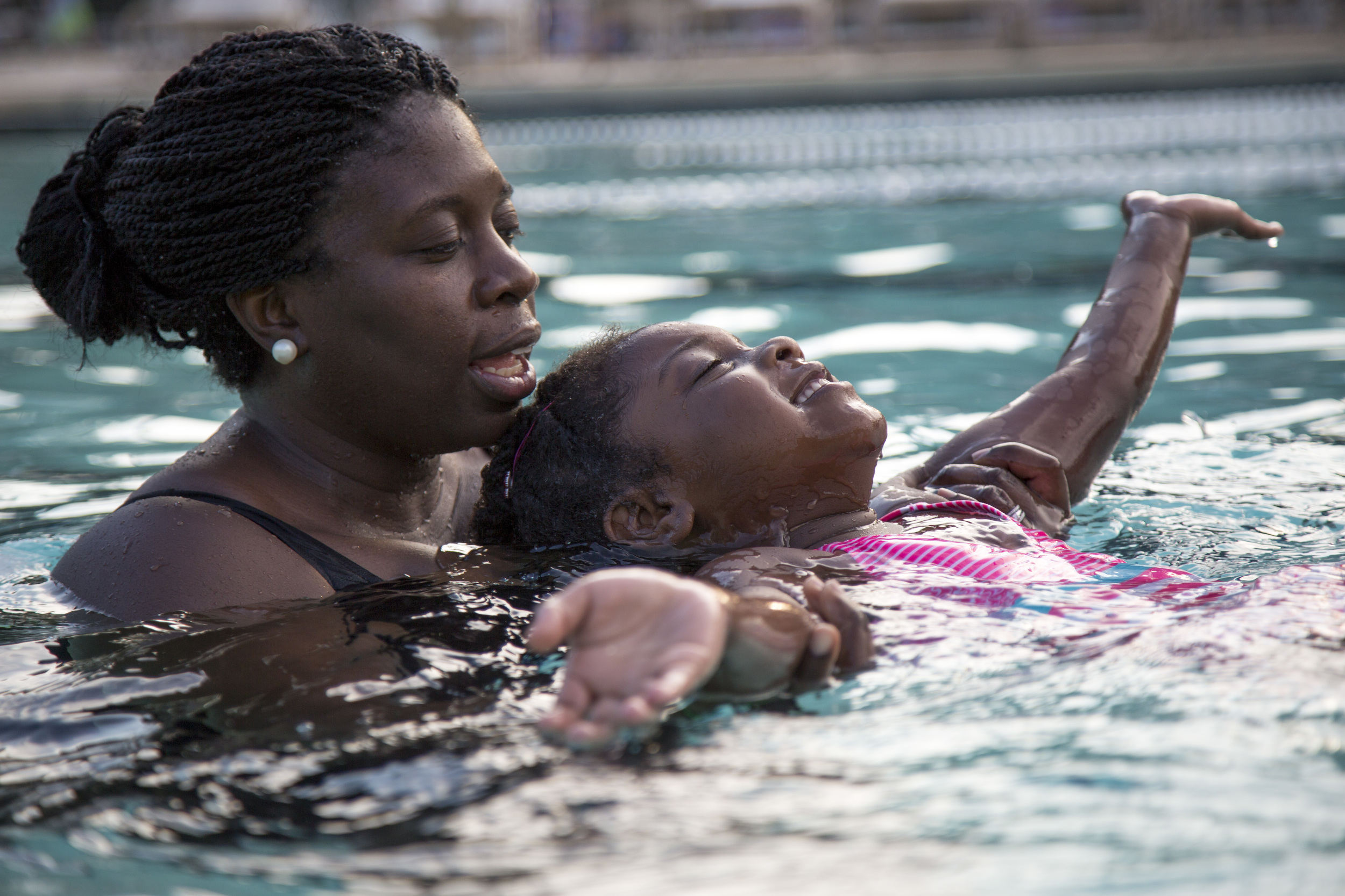 During the lessons, Trinity loves to float on her back and feel the water around her.