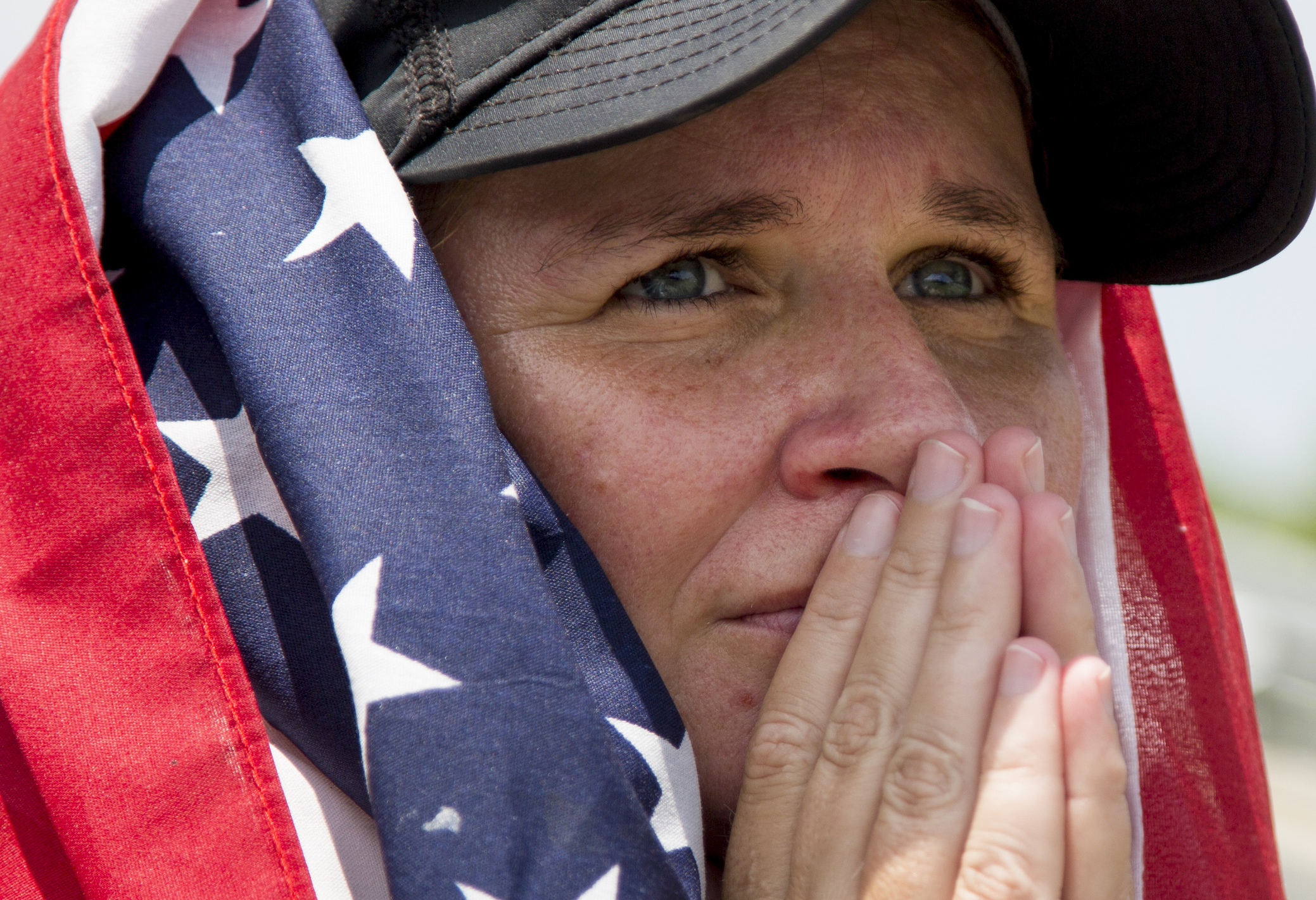 Kim Taylor from Zebulon anxiously watches the United States compete against Germany in the World Cup at a watch party at WakeMed Soccer Park Thursday, June 26, 2014, in Cary, N.C. The United States lost 1-0.