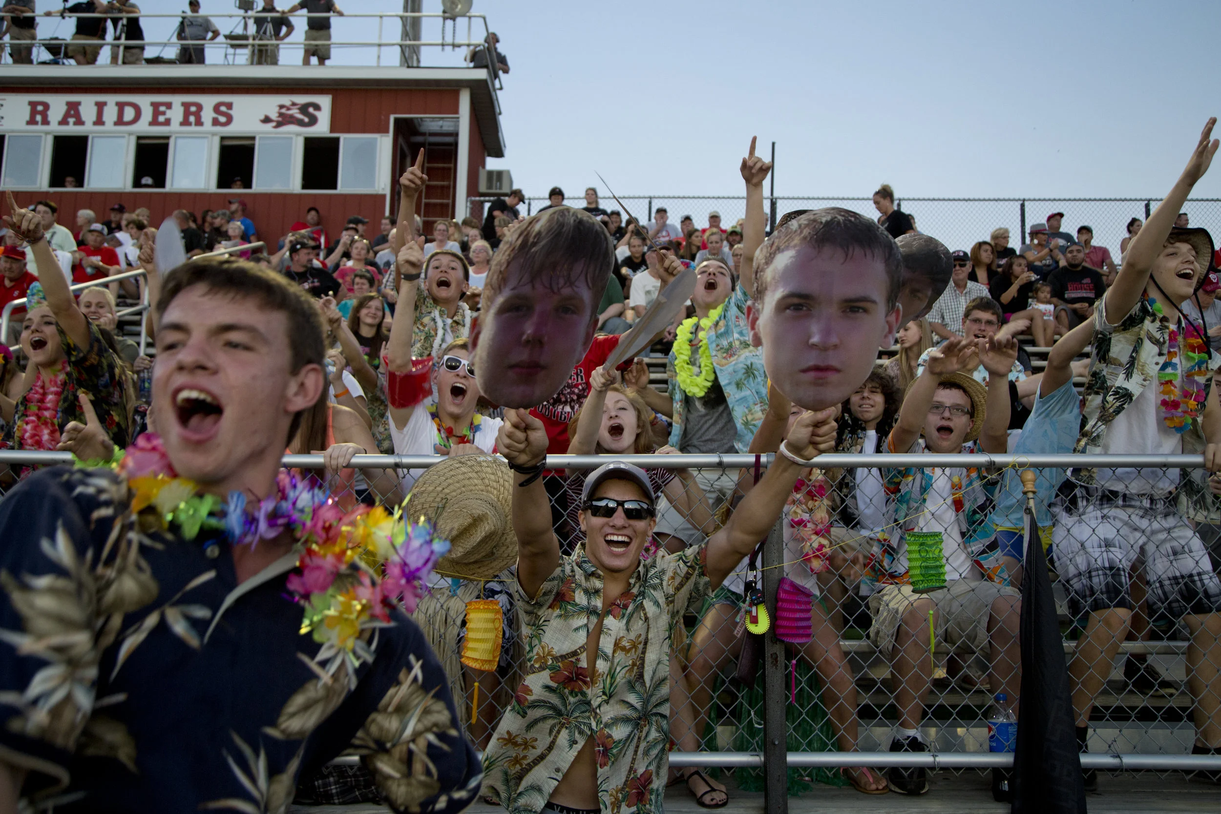 Southridge High School seniors Tristen Miller and Drew Dearing led the student section in a cheer before the start of the second half of the game against Corydon Central at Southridge High School in Huntingburg on Friday. The Raiders beat the Panthers 21-14.
