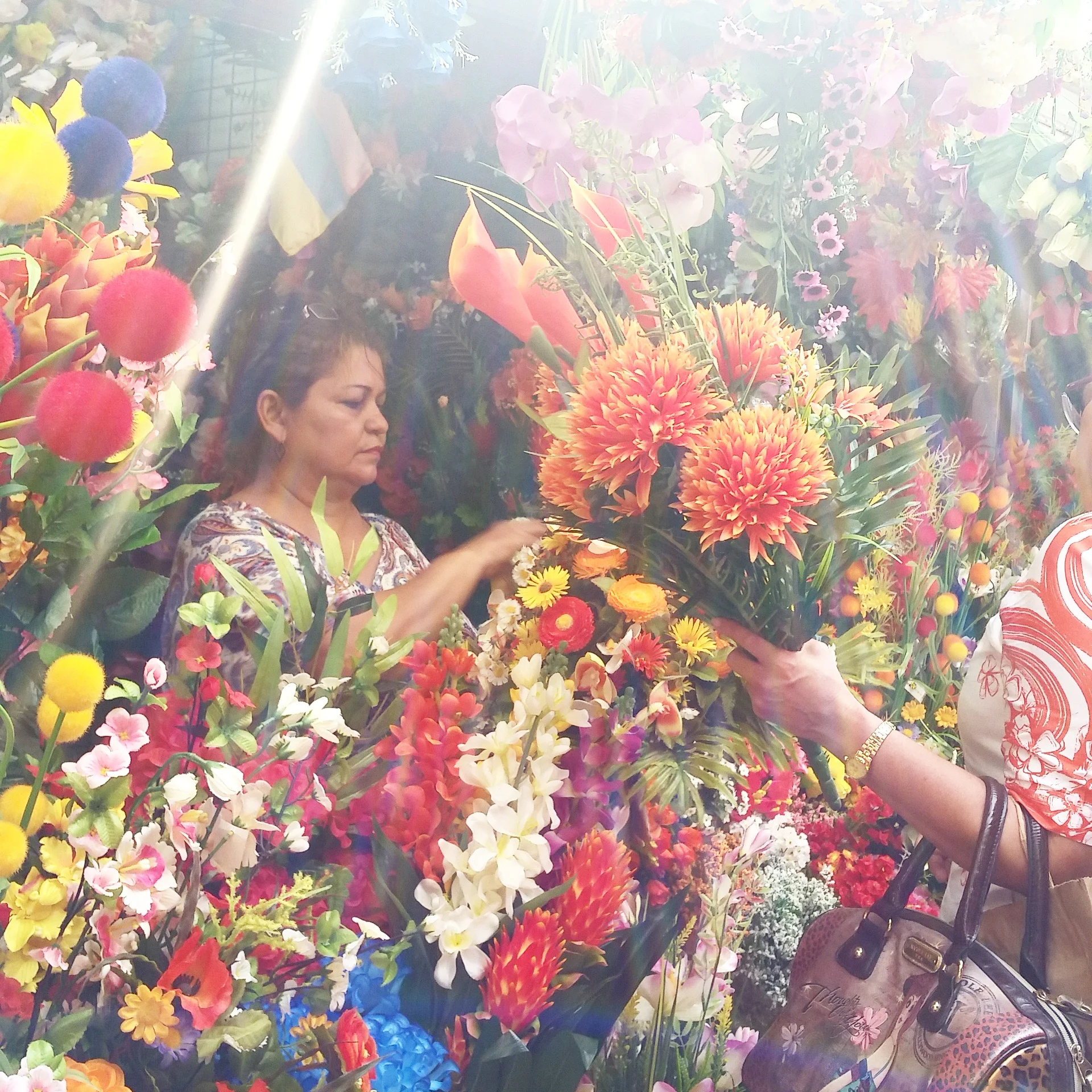 South America does have a touch of kitsch that I quite like. Take this flower market, for example, it's an entire alleyway of people selling fake flowers...and patrons rushing to buy them. They even spray the area with perfume! Amazing!