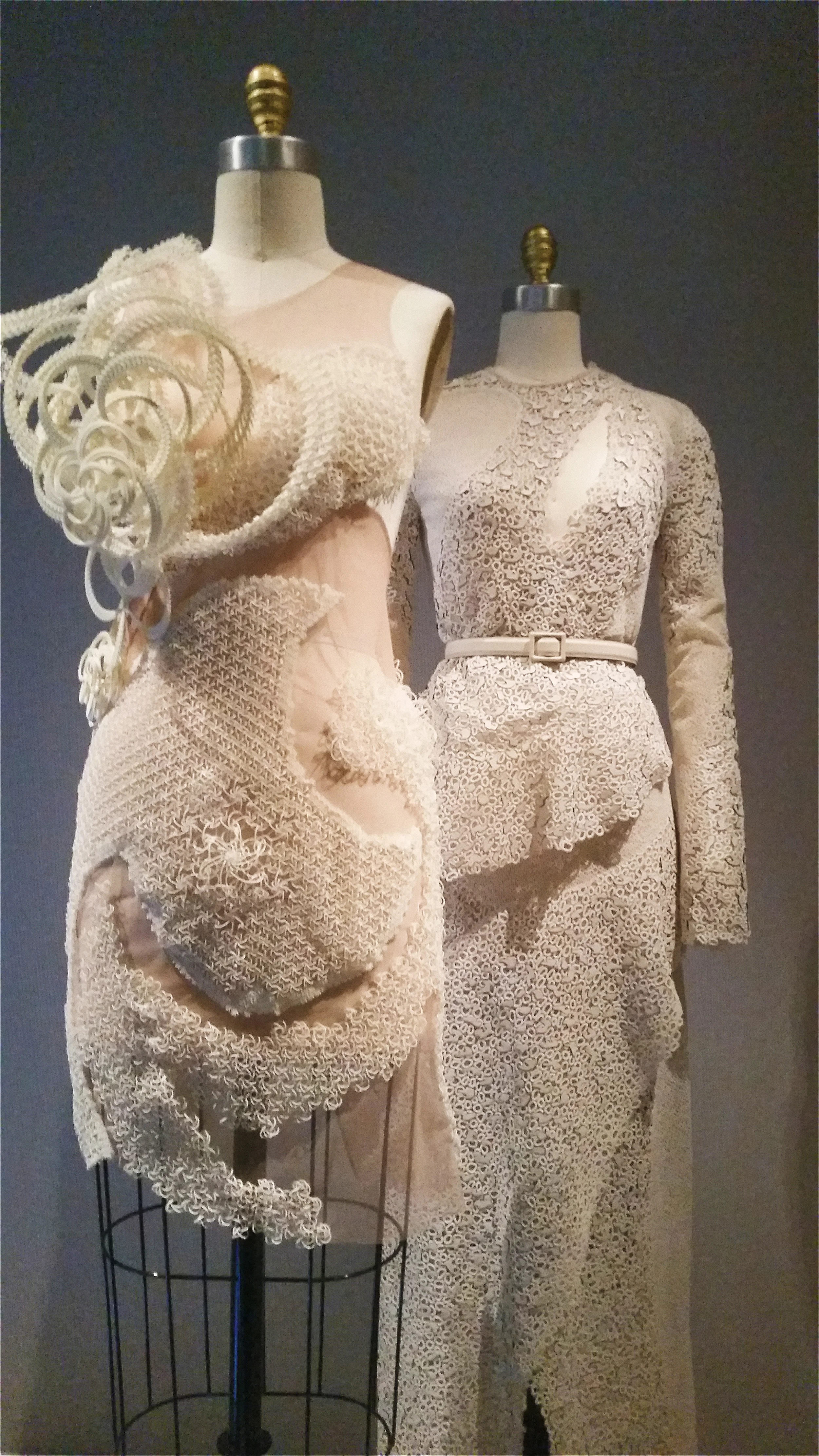 "These dresses are made from...custom lace that looks like guipure but is actually a kind of embroidery on a tulle base. It's called ceramic 'stone' lace because the yard has the same properties as ceramic....We began by drawing the patterns on a computer. The patterns were then embroidered - by machine - onto tulle. the fabric was then dipped into acid, causing the tulle to disolve...Then we decorated the material with our 'highfrequency' embroidery - bonding...abstract motifs...to the fabric by ultrasonic welding...The idea was to create dresses made from a new and completely modern type of lace." --Lazaro Hernandez & Jack McCollough