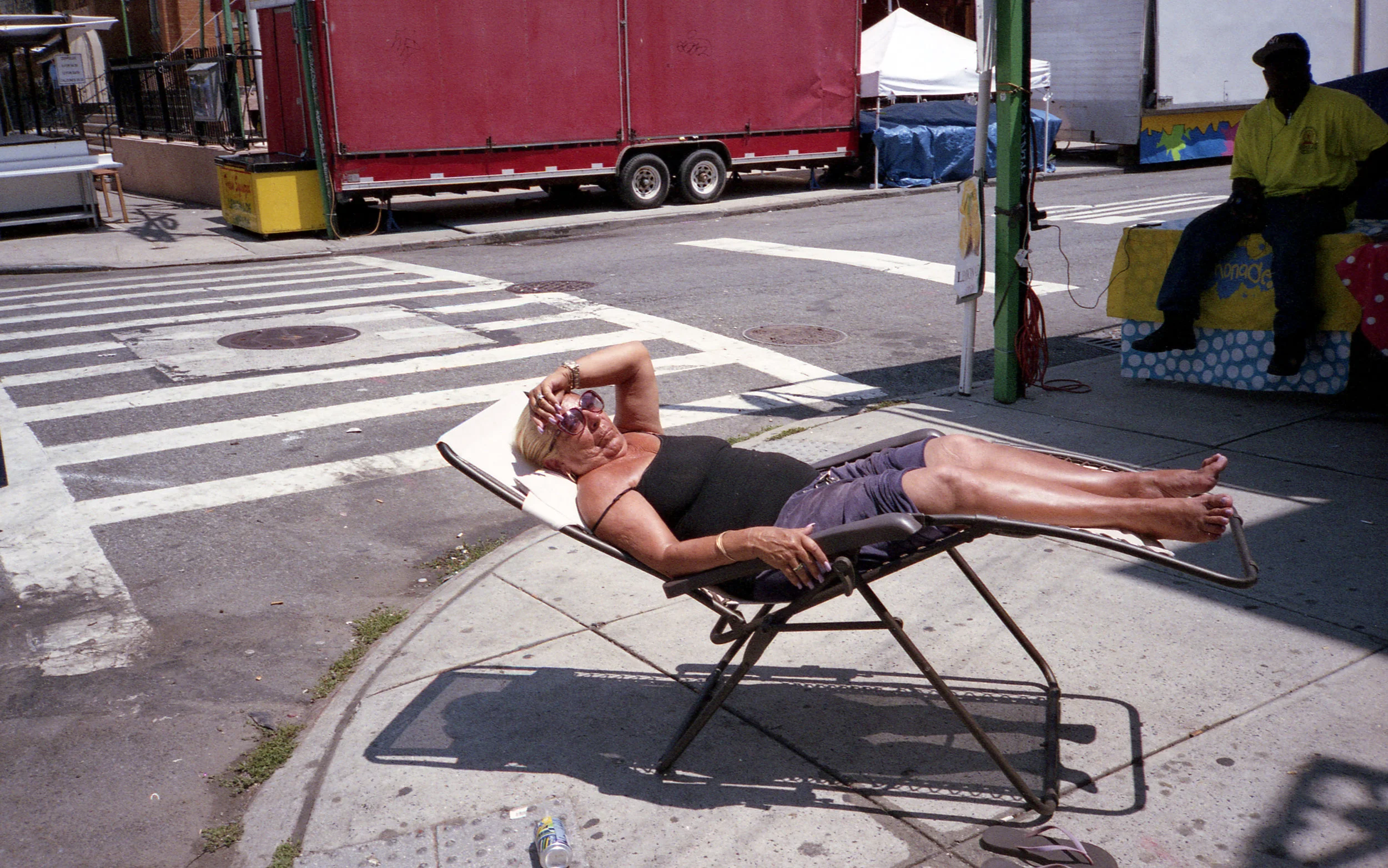 woman on lawnchair sidewalk.jpg