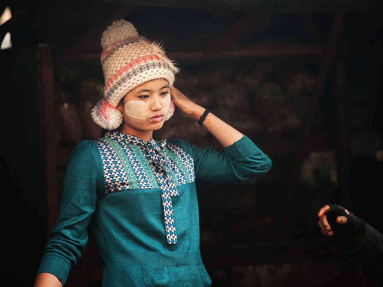 The majority of Burmese women wear the yellow thanaka bark patterns on their cheeks