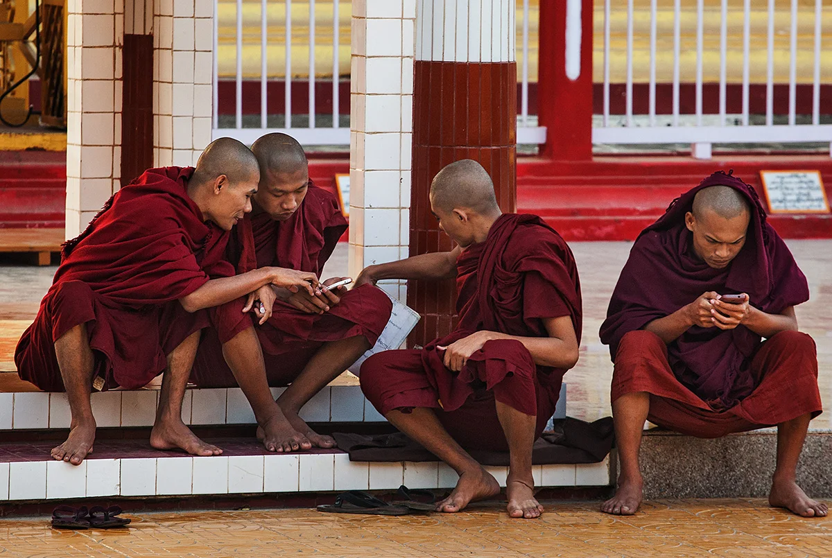 Monks doing other stuff than praying and looking pious