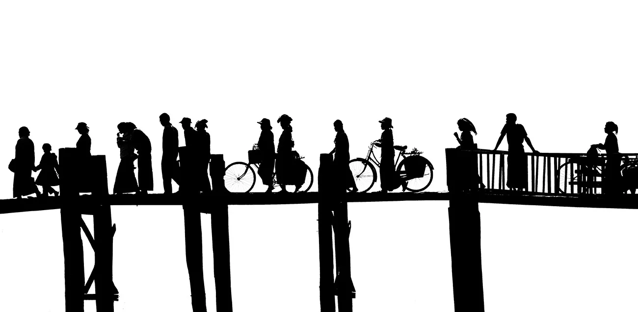 I love the silhouttes of the different people crossing the bridge