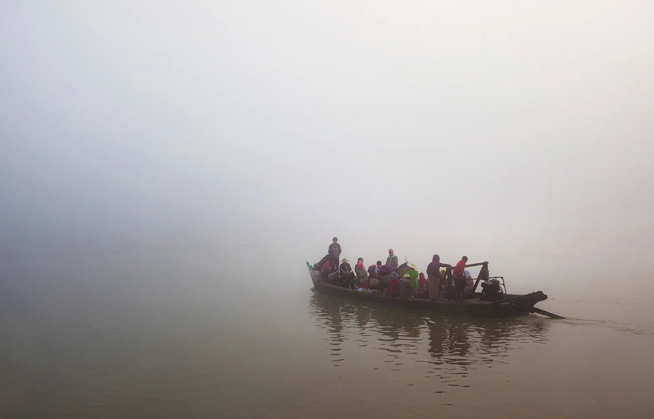 Public boat leaves the shore in Katha