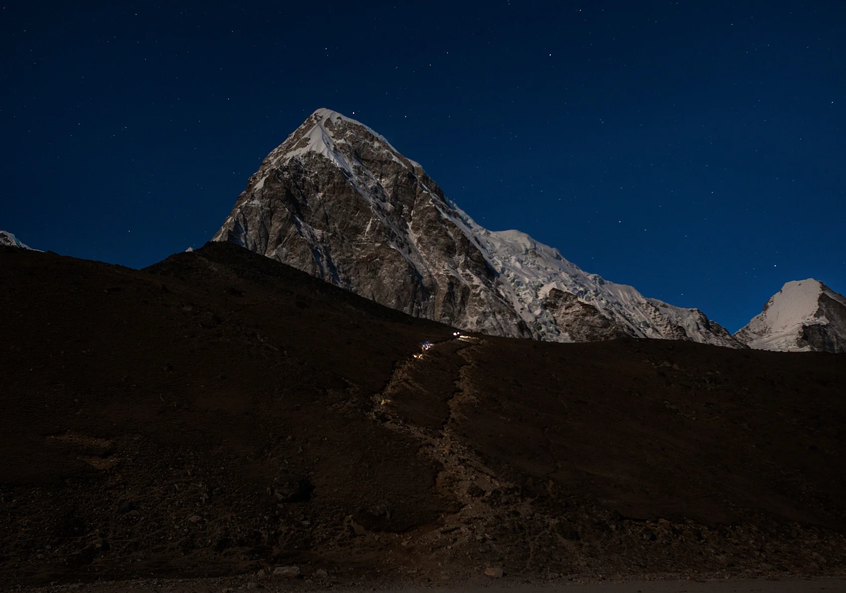 You can see hiker's headlamps walking up to Kala Pattar