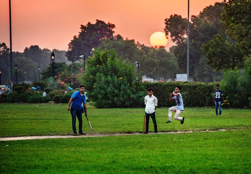 sun cricketeers around sunset