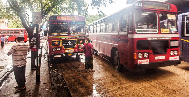 arriving at the bus station in a drizzle