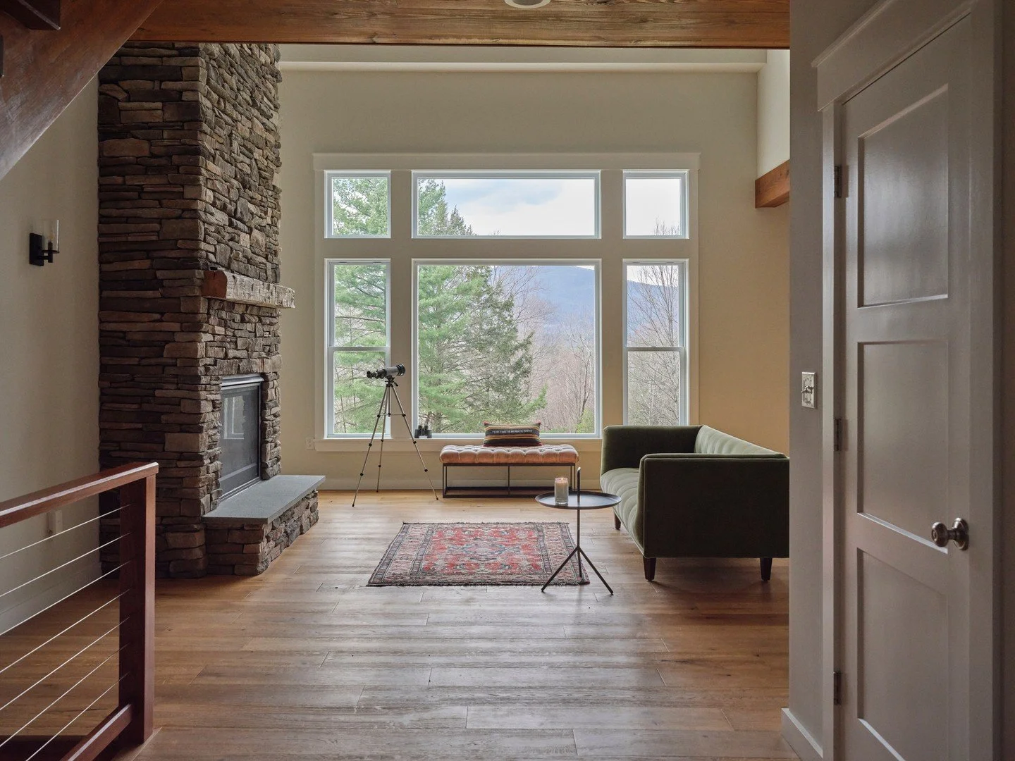 💫 NEW The setting does a lot of the talking at Mill Rock Farmhouse, set on 5 acres off a private road in Accord with the Catskill Mountains framed by cathedral ceilings and walls of glass. A floor-to-ceiling stone fireplace anchors the main living s