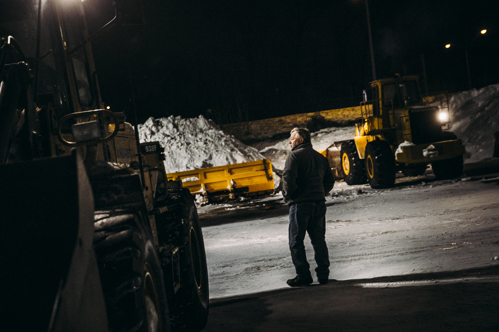 John Riley, who managed the night's project for OnSite, surveys the Solar St. parking lot before work began late Thursday night outside of Destiny USA. Crews began working at 11 p.m. and will continue to work until 8 a.m.
