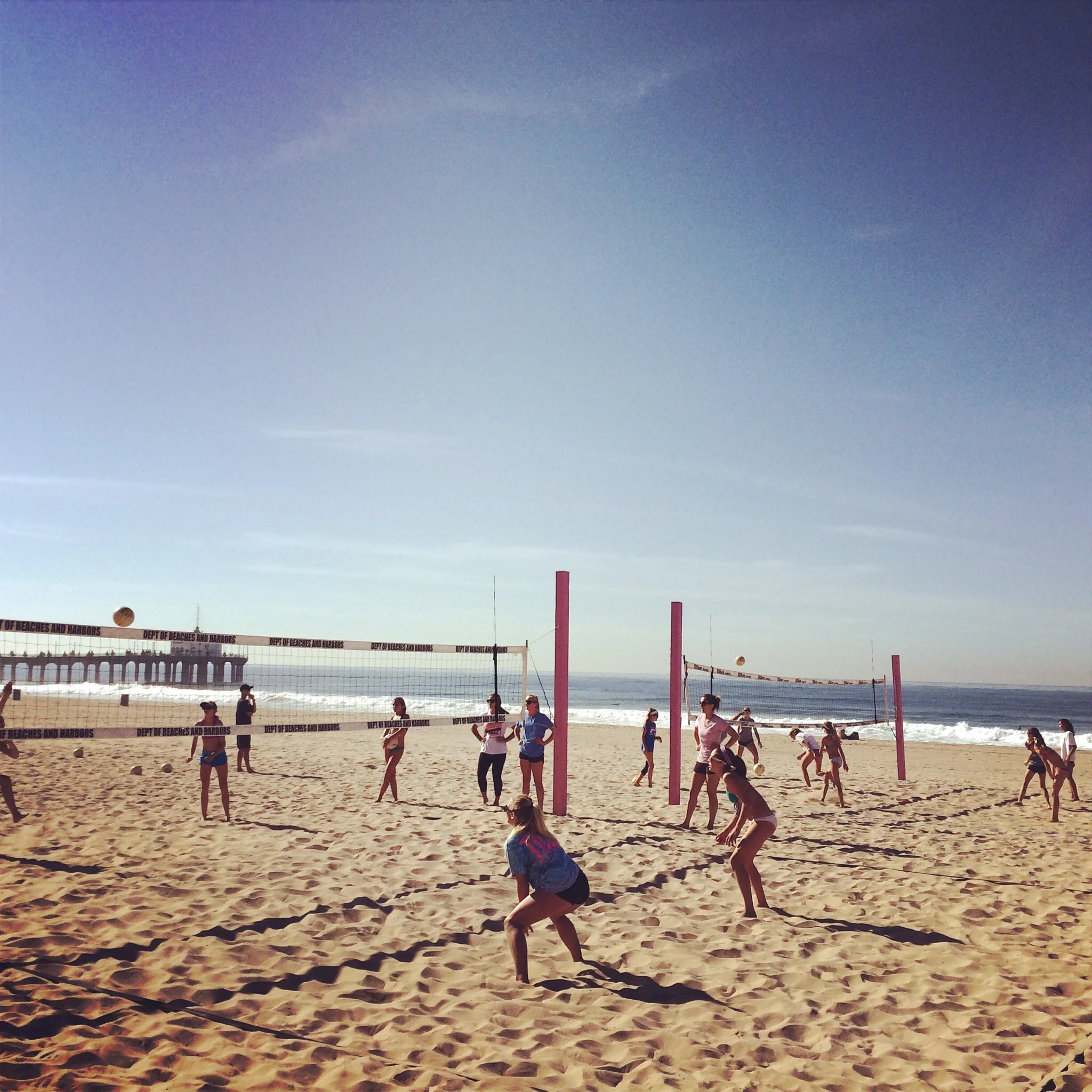 Two courts going at a time. 1 court has two mini games while the other court is full court beach vb!
